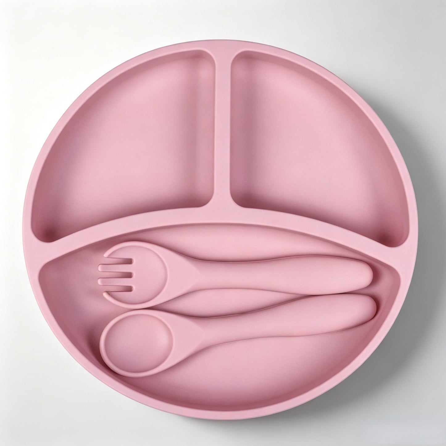 Best-selling silicone dining set for kids: baby weaning bowls, toddler cutlery (forks & spoons), and plates—feeding essentials for infants and young children.