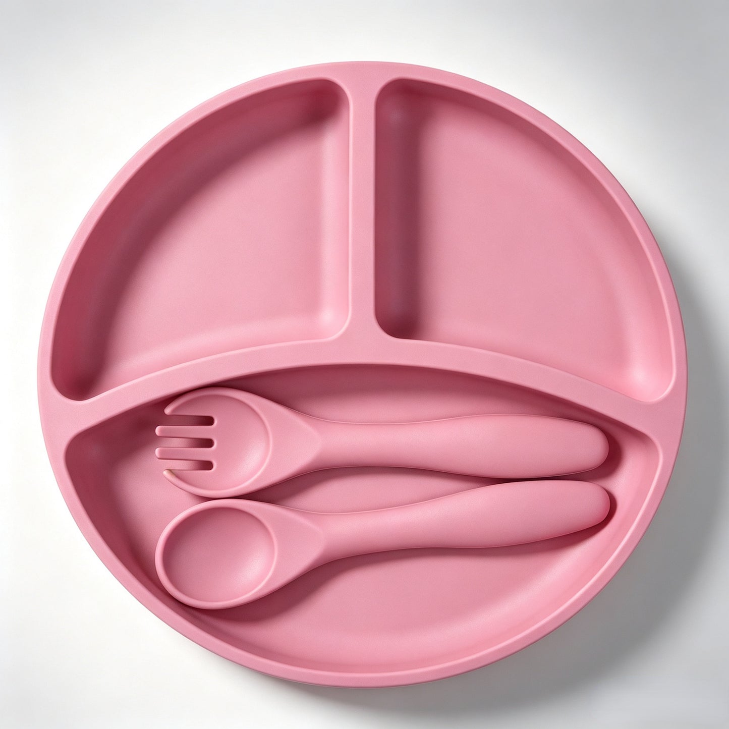 Best-selling silicone dining set for kids: baby weaning bowls, toddler cutlery (forks & spoons), and plates—feeding essentials for infants and young children.
