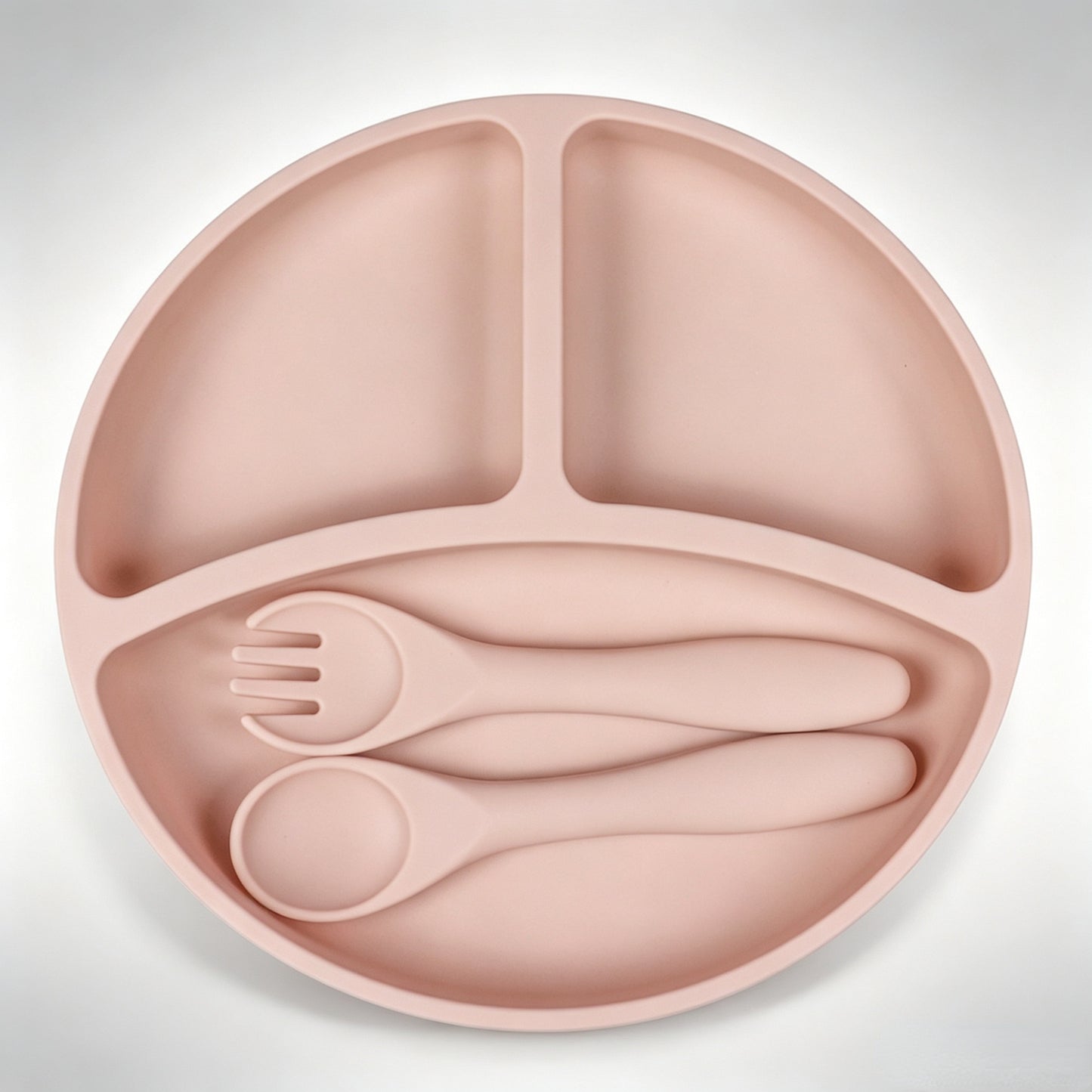 Best-selling silicone dining set for kids: baby weaning bowls, toddler cutlery (forks & spoons), and plates—feeding essentials for infants and young children.