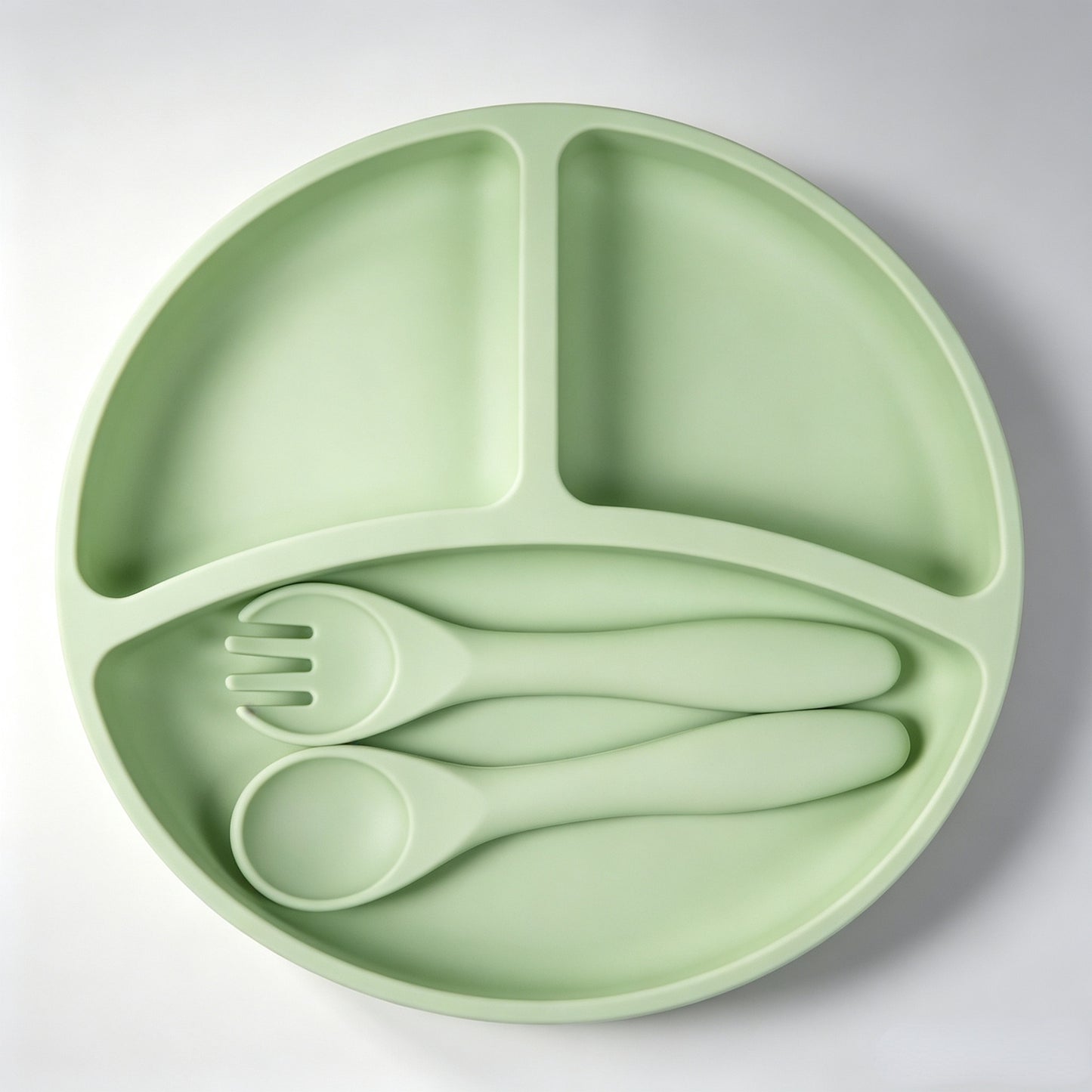 Best-selling silicone dining set for kids: baby weaning bowls, toddler cutlery (forks & spoons), and plates—feeding essentials for infants and young children.