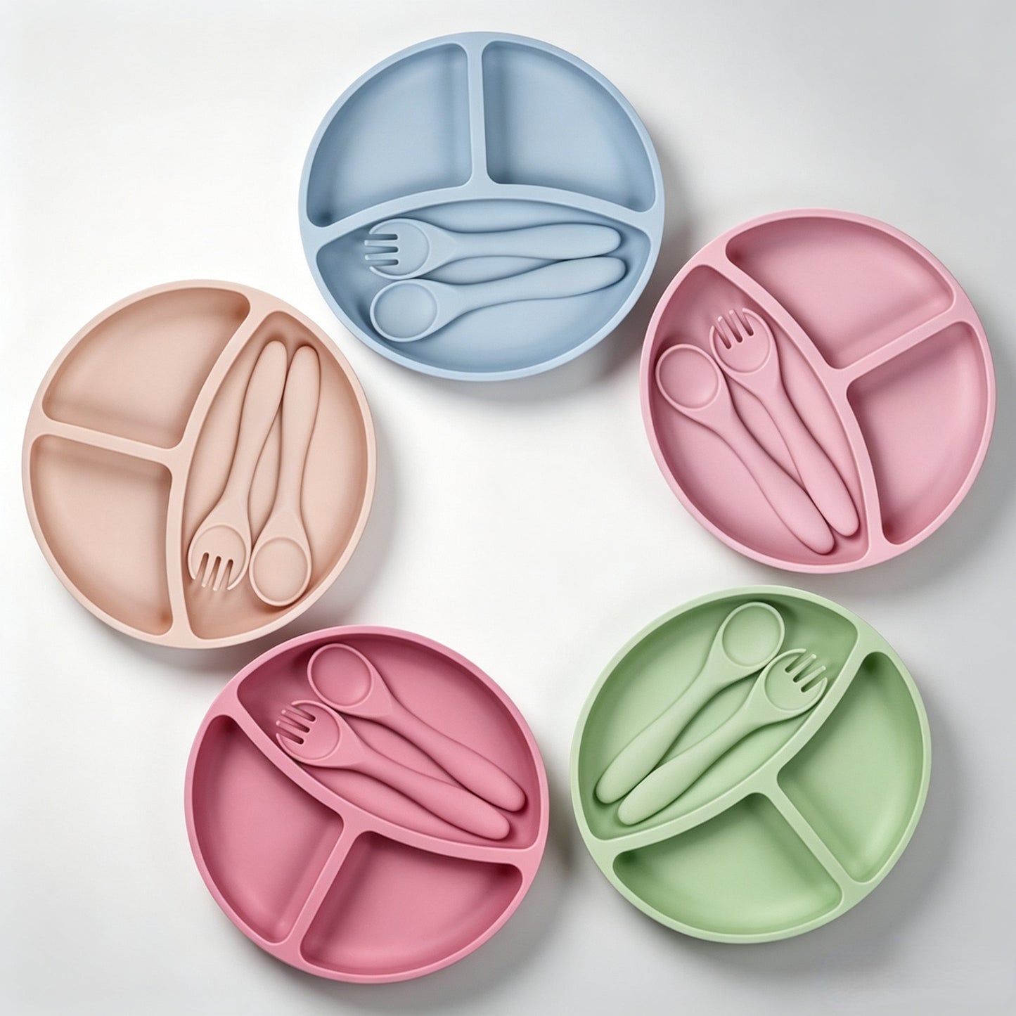 Best-selling silicone dining set for kids: baby weaning bowls, toddler cutlery (forks & spoons), and plates—feeding essentials for infants and young children.